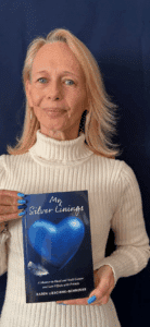 Karen holding her book
